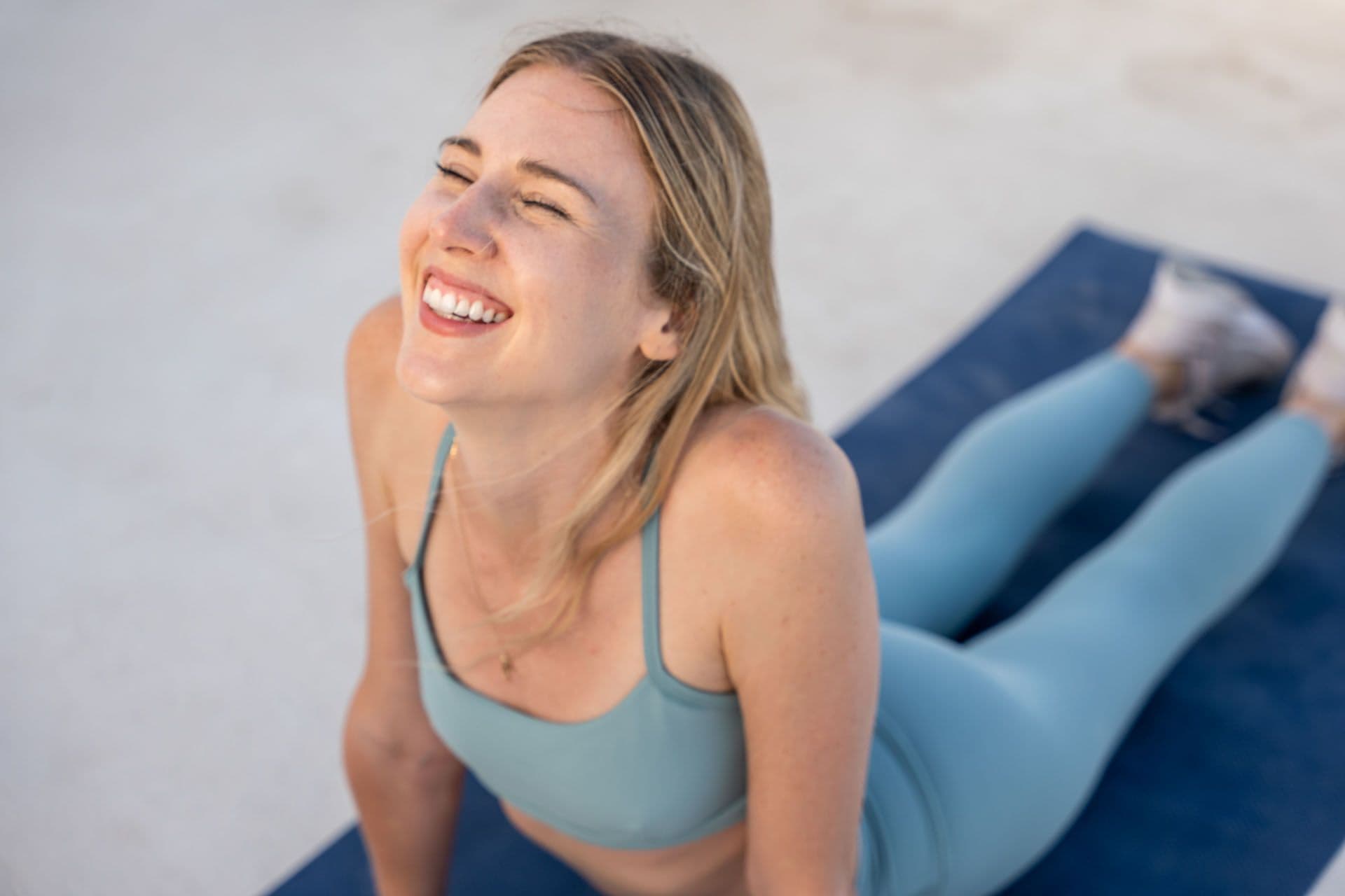 REVIV - Slimboost -Woman - Yoga -smiling